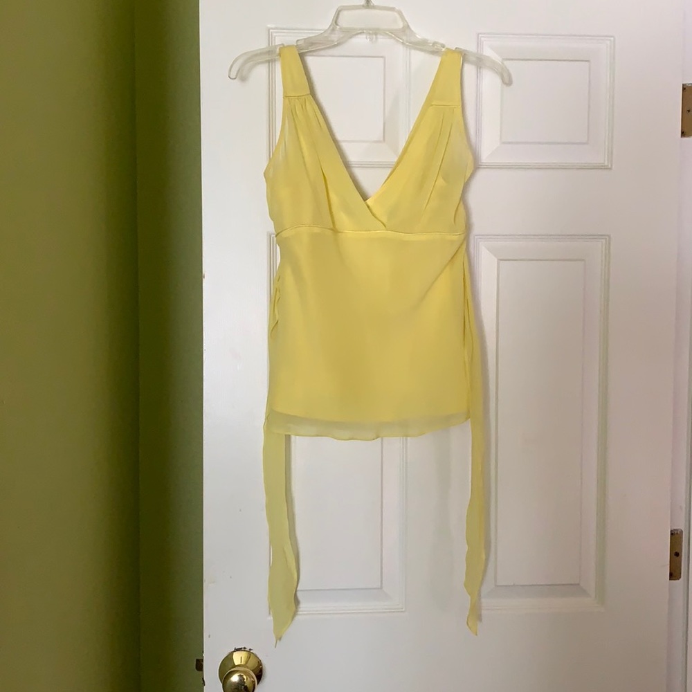 Silky ties in the back, dress up, or with jeans.